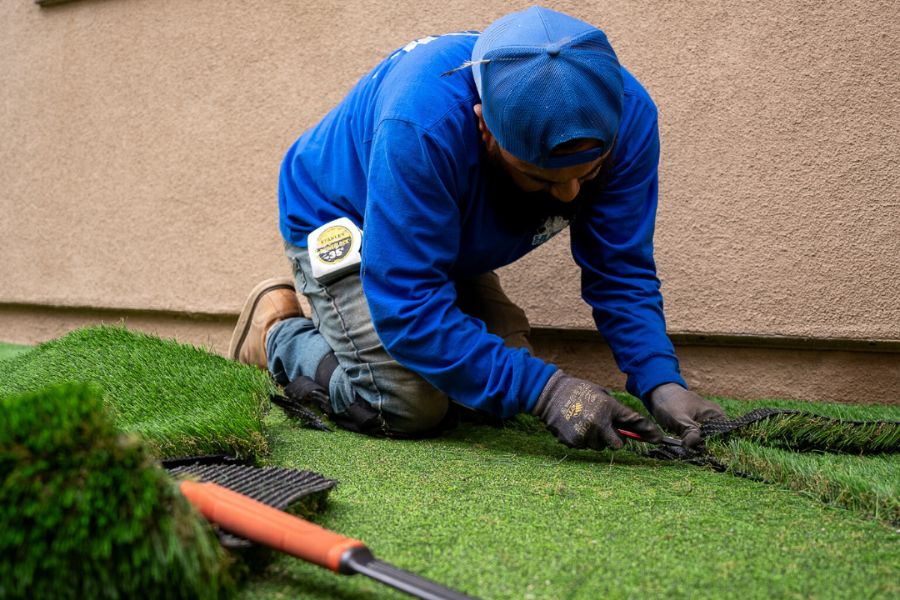 a well-maintained artificial lawn being installed in Murrieta