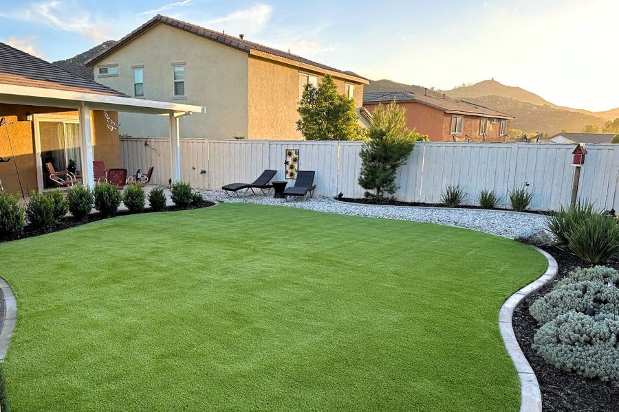 artificial turf backyard with a paver border in Canyon Lake